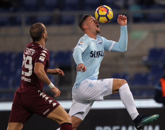 ROME, ITALY - DECEMBER 11: Sergej Milinkovic (R) of SS Lazio competes for the ball with Lorenzo De Silvestri of Torino FC during the Serie A match between SS Lazio and Torino FC at Stadio Olimpico on December 11, 2017 in Rome, Italy. (Photo by Paolo Bruno/Getty Images) ROME, ITALY - DECEMBER 11: Sergej Milinkovic (R) of SS Lazio competes for the ball with Lorenzo De Silvestri of Torino FC during the Serie A match between SS Lazio and Torino FC at Stadio Olimpico on December 11, 2017 in Rome, Italy. (Photo by Paolo Bruno/Getty Images)