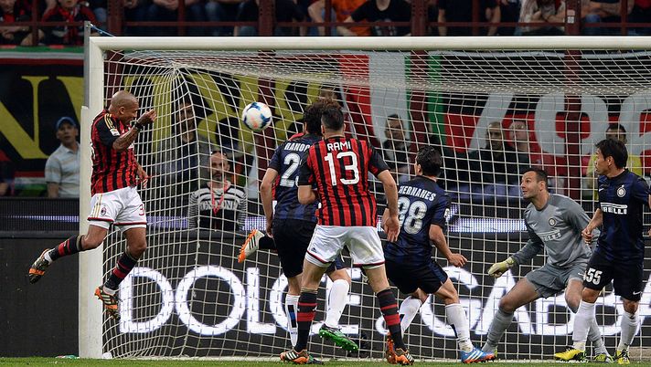 MILAN, ITALY - MAY 04: Nigel de Jong of AC Milan (L) scores the first goal during the Serie A match between AC Milan and FC Internazionale Milano at Stadio Giuseppe Meazza on May 4, 2014 in Milan, Italy. (Photo by Claudio Villa/Getty Images) MILAN, ITALY - MAY 04: Nigel de Jong of AC Milan (L) scores the first goal during the Serie A match between AC Milan and FC Internazionale Milano at Stadio Giuseppe Meazza on May 4, 2014 in Milan, Italy. (Photo by Claudio Villa/Getty Images)