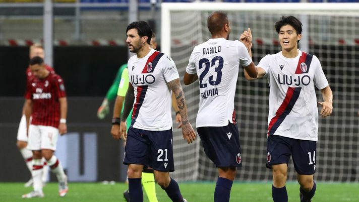 MILAN, ITALY - JULY 18: Takehiro Tomiyasu (R) of Bologna FC celebrates his goal with his team-mate Danilo Larangeira #23 during the Serie A match between AC Milan and Bologna FC at Stadio Giuseppe Meazza on July 18, 2020 in Milan, Italy. (Photo by Marco Luzzani/Getty Images) MILAN, ITALY - JULY 18: Takehiro Tomiyasu (R) of Bologna FC celebrates his goal with his team-mate Danilo Larangeira #23 during the Serie A match between AC Milan and Bologna FC at Stadio Giuseppe Meazza on July 18, 2020 in Milan, Italy. (Photo by Marco Luzzani/Getty Images)