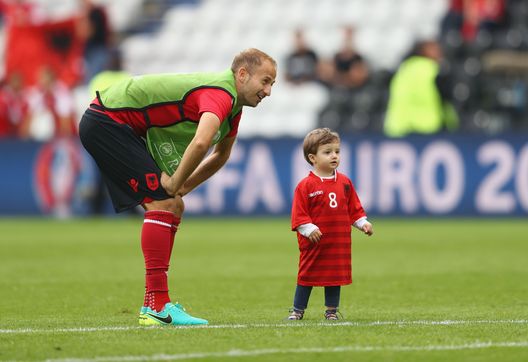 LENS, FRANCE - JUNE 11: Migjen Basha of Albania and his child are seen after the UEFA EURO 2016 Group A match between Albania and Switzerland at Stade Bollaert-Delelis on June 11, 2016 in Lens, France. (Photo by Clive Mason/Getty Images) LENS, FRANCE - JUNE 11: Migjen Basha of Albania and his child are seen after the UEFA EURO 2016 Group A match between Albania and Switzerland at Stade Bollaert-Delelis on June 11, 2016 in Lens, France. (Photo by Clive Mason/Getty Images)