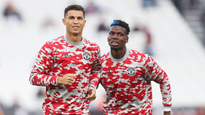 LONDON, ENGLAND - SEPTEMBER 19: Cristiano Ronaldo of Manchester United is seen warming up with Paul Pogba of Manchester United prior to the Premier League match between West Ham United and Manchester United at London Stadium on September 19, 2021 in London, England. (Photo by Julian Finney/Getty Images) LONDON, ENGLAND - SEPTEMBER 19: Cristiano Ronaldo of Manchester United is seen warming up with Paul Pogba of Manchester United prior to the Premier League match between West Ham United and Manchester United at London Stadium on September 19, 2021 in London, England. (Photo by Julian Finney/Getty Images)