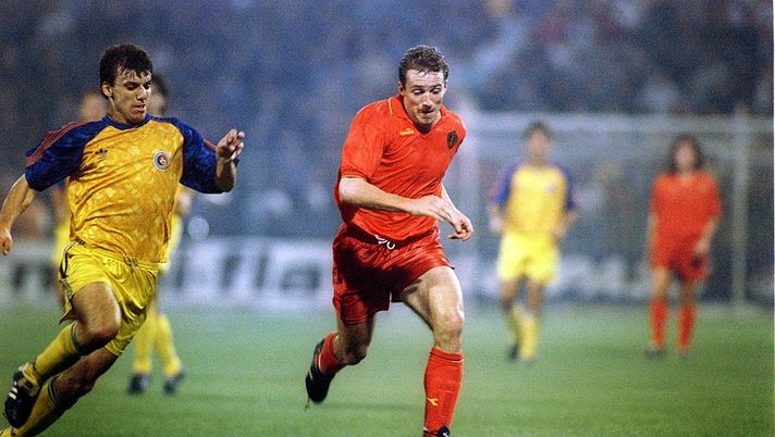 13 OCT 1993:  A PICTURE SHOWING MARC WILMOTS OF THE BELGIAN SOCCER TEAM WITH THE BALL AS HE IS CHALLENGED BY DANIEL PRODAN OF ROMANIA DURING THEIR WORLD CUP QUALIFYING MATCH IN BUCHAREST Mandatory Credit: Ben Radford/ALLSPORT  13 OCT 1993:  A PICTURE SHOWING MARC WILMOTS OF THE BELGIAN SOCCER TEAM WITH THE BALL AS HE IS CHALLENGED BY DANIEL PRODAN OF ROMANIA DURING THEIR WORLD CUP QUALIFYING MATCH IN BUCHAREST Mandatory Credit: Ben Radford/ALLSPORT