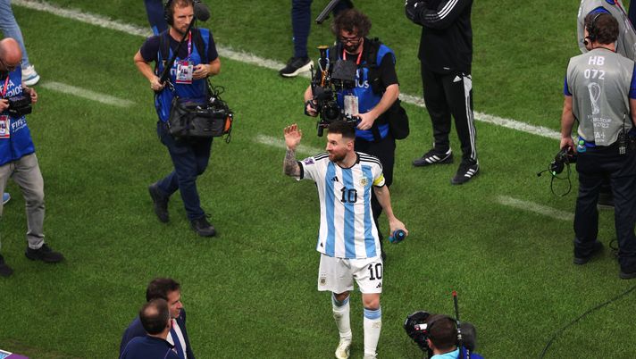 LUSAIL CITY, QATAR - DECEMBER 13: Lionel Messi of Argentina acknowledges fans following their sides victory after the FIFA World Cup Qatar 2022 semi final match between Argentina and Croatia at Lusail Stadium on December 13, 2022 in Lusail City, Qatar. (Photo by Julian Finney/Getty Images) ARGENTINA IN FINALE