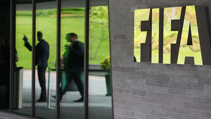 ZURICH, SWITZERLAND - MAY 27: A FIFA logo sits next to the entrance to the FIFA headquarters on May 27, 2015 in Zurich, Switzerland. Swiss police on Wednesday raided a Zurich hotel to detain top FIFA football officials as part of a US investigation into corruption. (Photo by Philipp Schmidli/Getty Images) ZURICH, SWITZERLAND - MAY 27: A FIFA logo sits next to the entrance to the FIFA headquarters on May 27, 2015 in Zurich, Switzerland. Swiss police on Wednesday raided a Zurich hotel to detain top FIFA football officials as part of a US investigation into corruption. (Photo by Philipp Schmidli/Getty Images)