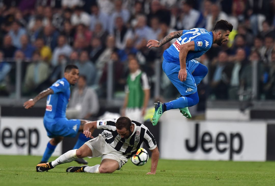  TURIN, ITALY - APRIL 22:  Gonzalo Higuain of Juventus competes for the ball with Elseid Hysaj of SSC Napoli during the serie A match between Juventus and SSC Napoli on April 22, 2018 in Turin, Italy.  (Photo by Tullio Puglia - Juventus/Juventus FC via Getty Images) 