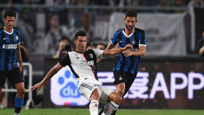 NANJING, CHINA - JULY 24: Cristiano Ronaldo of Juventus is tackled by Robeto Gagliardini of FC Internazionale during the International Champions Cup match between Juventus and FC Internazionale at the Nanjing Olympic Center Stadium on July 24, 2019 in Nanjing, China. (Photo by Claudio Villa - Inter/FC Internazionale via Getty Images) NANJING, CHINA - JULY 24: Cristiano Ronaldo of Juventus is tackled by Robeto Gagliardini of FC Internazionale during the International Champions Cup match between Juventus and FC Internazionale at the Nanjing Olympic Center Stadium on July 24, 2019 in Nanjing, China. (Photo by Claudio Villa - Inter/FC Internazionale via Getty Images)