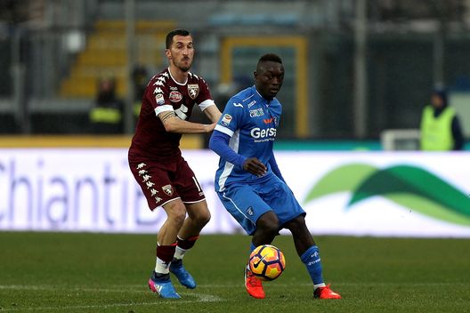 EMPOLI, ITALY - FEBRUARY 05: Assane Diousse' of Empoli Fc in action agaist Mirko Valdifiori of FC Torino during the Serie A match between Empoli FC and FC Torino at Stadio Carlo Castellani on February 5, 2017 in Empoli, Italy. (Photo by Gabriele Maltinti/Getty Images) EMPOLI, ITALY - FEBRUARY 05: Assane Diousse' of Empoli Fc in action agaist Mirko Valdifiori of FC Torino during the Serie A match between Empoli FC and FC Torino at Stadio Carlo Castellani on February 5, 2017 in Empoli, Italy. (Photo by Gabriele Maltinti/Getty Images)