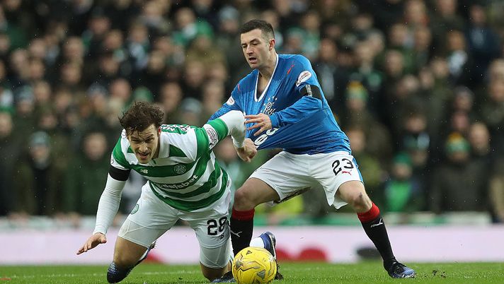 GLASGOW, SCOTLAND - DECEMBER 31: Erik Sviatchenko of Celtic vies with Jason Holt of Rangers during the Rangers v Celtic Ladbrokes Scottish Premiership match at Ibrox Stadium on December 31, 2016 in Glasgow, Scotland. (Photo by Ian MacNicol/Getty Images) GLASGOW, SCOTLAND - DECEMBER 31: Erik Sviatchenko of Celtic vies with Jason Holt of Rangers during the Rangers v Celtic Ladbrokes Scottish Premiership match at Ibrox Stadium on December 31, 2016 in Glasgow, Scotland. (Photo by Ian MacNicol/Getty Images)
