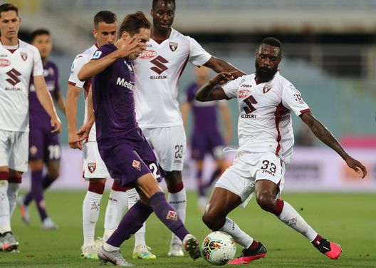 FLORENCE, ITALY - JULY 19: Fedrerico Chiesa of ACF Fiorentina battles for the ball with Nicolas Nkoulou of Torino FC during the Serie A match between ACF Fiorentina and Torino FC at Stadio Artemio Franchi on July 19, 2020 in Florence, Italy. (Photo by Gabriele Maltinti/Getty Images) FLORENCE, ITALY - JULY 19: Fedrerico Chiesa of ACF Fiorentina battles for the ball with Nicolas Nkoulou of Torino FC during the Serie A match between ACF Fiorentina and Torino FC at Stadio Artemio Franchi on July 19, 2020 in Florence, Italy. (Photo by Gabriele Maltinti/Getty Images)