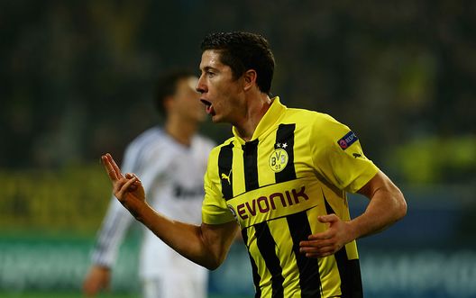 DORTMUND, GERMANY - OCTOBER 24: Robert Lewandowski of Dortmund celebrates after he scores his team's opening goal during the UEFA Champions League group D match between Borussia Dortmund and Real Madrid at Signal Iduna Parkon October 24, 2012 in Dortmund, Germany. (Photo by Martin Rose/Bongarts/Getty Images) DORTMUND, GERMANY - OCTOBER 24: Robert Lewandowski of Dortmund celebrates after he scores his team's opening goal during the UEFA Champions League group D match between Borussia Dortmund and Real Madrid at Signal Iduna Parkon October 24, 2012 in Dortmund, Germany. (Photo by Martin Rose/Bongarts/Getty Images)