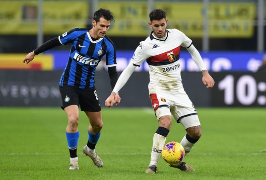 MILAN, ITALY - DECEMBER 21: Antonio Sanabria of Genoa CFC challenged by Antonio Candreva of FC Internazionale during the Serie A match between FC Internazionale and Genoa CFC at Stadio Giuseppe Meazza on December 21, 2019 in Milan, Italy. (Photo by Chris Ricco/Getty Images) MILAN, ITALY - DECEMBER 21: Antonio Sanabria of Genoa CFC challenged by Antonio Candreva of FC Internazionale during the Serie A match between FC Internazionale and Genoa CFC at Stadio Giuseppe Meazza on December 21, 2019 in Milan, Italy. (Photo by Chris Ricco/Getty Images)