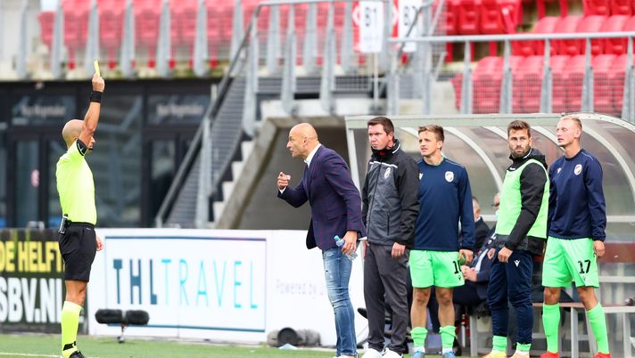 ALKMAAR, NETHERLANDS - AUGUST 26: Adrian Gul'a, Manager of FC Viktoria Plzen is shown a yellow card by referee Luis Godinho during the UEFA Champions League qualification match between AZ Alkmaar and FC Viktoria Plzen at AZ Stadion, Alkmaar, Netherlands on August 26, 2020 in Alkmaar, Netherlands. (Photo by Dean Mouhtaropoulos/Getty Images) ALKMAAR, NETHERLANDS - AUGUST 26: Adrian Gul'a, Manager of FC Viktoria Plzen is shown a yellow card by referee Luis Godinho during the UEFA Champions League qualification match between AZ Alkmaar and FC Viktoria Plzen at AZ Stadion, Alkmaar, Netherlands on August 26, 2020 in Alkmaar, Netherlands. (Photo by Dean Mouhtaropoulos/Getty Images)
