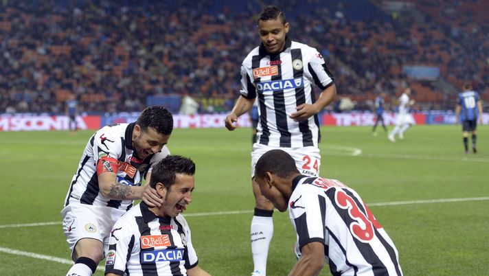 MILAN, ITALY - MAY 19: Giampiero Pinzi of Udinese Calcio (C) celebrates scoring the first goal during the Serie A match between FC Internazionale Milano and Udinese Calcio at San Siro Stadium on May 19, 2013 in Milan, Italy. (Photo by Claudio Villa/Getty Images) MILAN, ITALY - MAY 19: Giampiero Pinzi of Udinese Calcio (C) celebrates scoring the first goal during the Serie A match between FC Internazionale Milano and Udinese Calcio at San Siro Stadium on May 19, 2013 in Milan, Italy. (Photo by Claudio Villa/Getty Images)