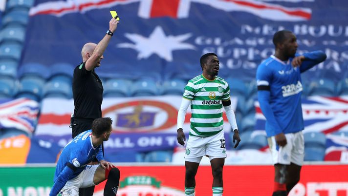 GLASGOW, SCOTLAND - JANUARY 02: Referee, Bobby Madden shows Ismaila Soro of Celtic a yellow card during the Ladbrokes Scottish Premiership match between Rangers and Celtic at Ibrox Stadium on January 02, 2021 in Glasgow, Scotland. The match will be played without fans, behind closed doors as a Covid-19 precaution. (Photo by Ian MacNicol/Getty Images) GLASGOW, SCOTLAND - JANUARY 02: Referee, Bobby Madden shows Ismaila Soro of Celtic a yellow card during the Ladbrokes Scottish Premiership match between Rangers and Celtic at Ibrox Stadium on January 02, 2021 in Glasgow, Scotland. The match will be played without fans, behind closed doors as a Covid-19 precaution. (Photo by Ian MacNicol/Getty Images)