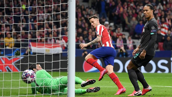 MADRID, SPAIN - FEBRUARY 18: Saul Niguez of Atletico Madrid scores his team's first goal past Alisson Becker of Liverpool during the UEFA Champions League round of 16 first leg match between Atletico Madrid and Liverpool FC at Wanda Metropolitano on February 18, 2020 in Madrid, Spain. (Photo by Michael Regan/Getty Images) MADRID, SPAIN - FEBRUARY 18: Saul Niguez of Atletico Madrid scores his team's first goal past Alisson Becker of Liverpool during the UEFA Champions League round of 16 first leg match between Atletico Madrid and Liverpool FC at Wanda Metropolitano on February 18, 2020 in Madrid, Spain. (Photo by Michael Regan/Getty Images)