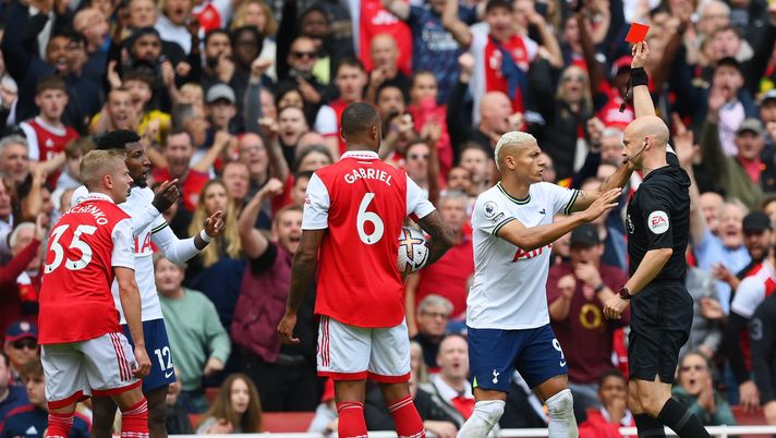 LONDON, ENGLAND - OCTOBER 01: Richarlison of Tottenham Hotspur reacts as match referee Anthony Taylor shows a red card to Emerson Royal of Tottenham Hotspur during the Premier League match between Arsenal FC and Tottenham Hotspur at Emirates Stadium on October 01, 2022 in London, England. (Photo by Shaun Botterill/Getty Images) ARSENAL-TOTTENHAM 3-1