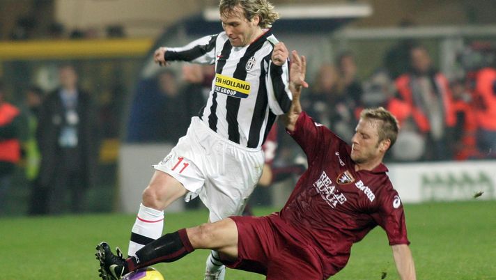 TURIN, ITALY - FEBRAURY 26: Vincenzo Grella of Torino clashes with Pavel Nedved of Juventus during the Serie A match between Torino and Juventus at the Stadio Olimpico on Febraury 26, 2008 in Turin, Italy. (Photo by New Press/Getty Images) TURIN, ITALY - FEBRAURY 26: Vincenzo Grella of Torino clashes with Pavel Nedved of Juventus during the Serie A match between Torino and Juventus at the Stadio Olimpico on Febraury 26, 2008 in Turin, Italy. (Photo by New Press/Getty Images)