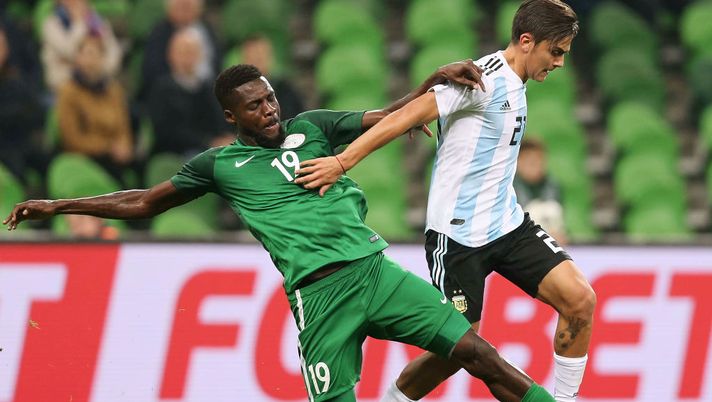 KRASNODAR, RUSSIA - NOVEMBER 14: Paulo Dybala of Argentina competes for the ball with John Ogu of Nigeria during an international friendly match between Argentina and Nigeria at Krasnodar Stadium on November 14, 2017 in Krasnodar, Russia. (Photo by Oleg Nikishin/Getty Images) KRASNODAR, RUSSIA - NOVEMBER 14: Paulo Dybala of Argentina competes for the ball with John Ogu of Nigeria during an international friendly match between Argentina and Nigeria at Krasnodar Stadium on November 14, 2017 in Krasnodar, Russia. (Photo by Oleg Nikishin/Getty Images)