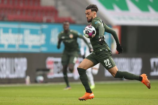  AUGSBURG, GERMANY - JANUARY 10: Nicolas Gonzalez of Stuttgart runs with the ball during the Bundesliga match between FC Augsburg and VfB Stuttgart at WWK-Arena on January 10, 2021 in Augsburg, Germany. Sporting stadiums around Germany remain under strict restrictions due to the Coronavirus Pandemic as Government social distancing laws prohibit fans inside venues resulting in games being played behind closed doors. (Photo by Alexander Hassenstein/Getty Images) 