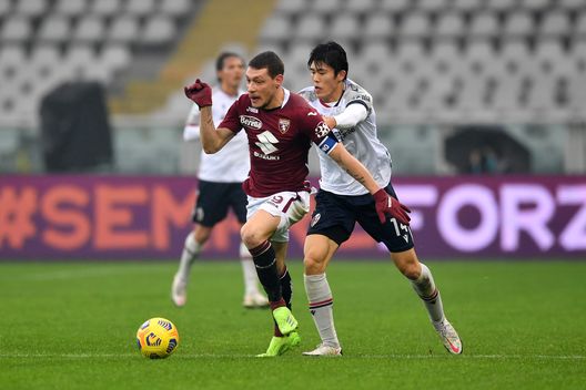TURIN, ITALY - DECEMBER 20: Andrea Belotti of Torino battles for possession with Takehiro Tomiyasu of Bologna during the Serie A match between Torino FC and Bologna FC at Stadio Olimpico di Torino on December 20, 2020 in Turin, Italy. Sporting stadiums around Italy remain under strict restrictions due to the Coronavirus Pandemic as Government social distancing laws prohibit fans inside venues resulting in games being played behind closed doors. (Photo by Valerio Pennicino/Getty Images) TURIN, ITALY - DECEMBER 20: Andrea Belotti of Torino battles for possession with Takehiro Tomiyasu of Bologna during the Serie A match between Torino FC and Bologna FC at Stadio Olimpico di Torino on December 20, 2020 in Turin, Italy. Sporting stadiums around Italy remain under strict restrictions due to the Coronavirus Pandemic as Government social distancing laws prohibit fans inside venues resulting in games being played behind closed doors. (Photo by Valerio Pennicino/Getty Images)