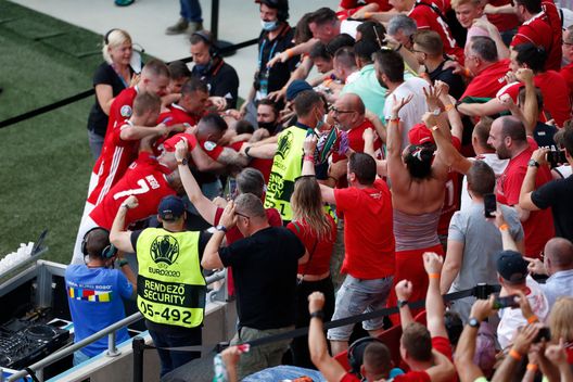 BUDAPEST, HUNGARY - JUNE 19: Fans of Hungary celebrate after their side's first goal scored by Attila Fiola of Hungary (obscured) during the UEFA Euro 2020 Championship Group F match between Hungary and France at Puskas Arena on June 19, 2021 in Budapest, Hungary. (Photo by Laszlo Balogh - Pool/Getty Images) BUDAPEST, HUNGARY - JUNE 19: Fans of Hungary celebrate after their side's first goal scored by Attila Fiola of Hungary (obscured) during the UEFA Euro 2020 Championship Group F match between Hungary and France at Puskas Arena on June 19, 2021 in Budapest, Hungary. (Photo by Laszlo Balogh - Pool/Getty Images)