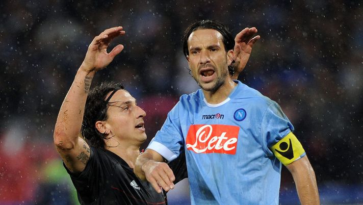 NAPLES, ITALY - OCTOBER 25:  Zlatan Ibrahimovic of AC Milan and Gianluca Grava of Napoli in action during the Serie A match between SSC Napoli and AC Milan at Stadio San Paolo on October 25, 2010 in Naples, Italy.  (Photo by Giuseppe Bellini/Getty Images) 