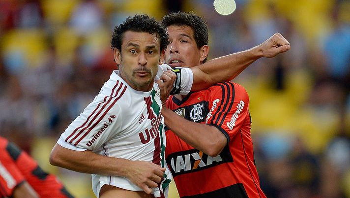 RIO DE JANEIRO, BRAZIL - MAY 11: Fred (L) of Fluminense battle with Caceres (R) of Flamengo during the match between Fluminense and Flamengo as part of Brasileirao Series A 2014 at Maracana on May 11, 2014 in Rio de Janeiro, Brazil. (Photo by Alexandre Loureiro/Getty Images) RIO DE JANEIRO, BRAZIL - MAY 11: Fred (L) of Fluminense battle with Caceres (R) of Flamengo during the match between Fluminense and Flamengo as part of Brasileirao Series A 2014 at Maracana on May 11, 2014 in Rio de Janeiro, Brazil. (Photo by Alexandre Loureiro/Getty Images)