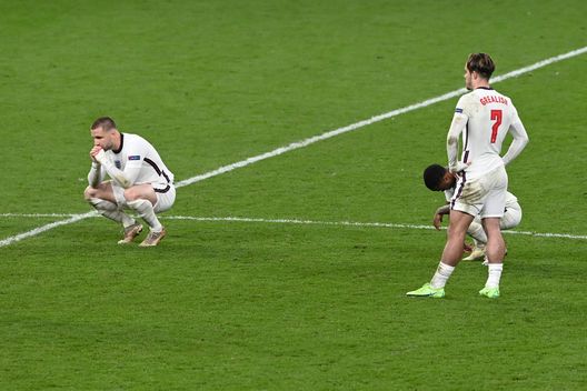 LONDON, ENGLAND - JULY 11: Luke Shaw, Raheem Sterling and Jack Grealish of England look dejected following their team's defeat in the UEFA Euro 2020 Championship Final between Italy and England at Wembley Stadium on July 11, 2021 in London, England. (Photo by Facundo Arrizabalaga - Pool/Getty Images) LONDON, ENGLAND - JULY 11: Luke Shaw, Raheem Sterling and Jack Grealish of England look dejected following their team's defeat in the UEFA Euro 2020 Championship Final between Italy and England at Wembley Stadium on July 11, 2021 in London, England. (Photo by Facundo Arrizabalaga - Pool/Getty Images)