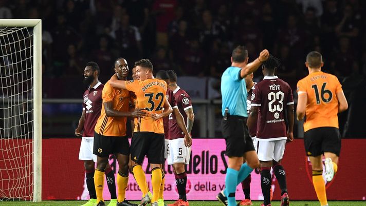 TURIN, ITALY - AUGUST 22: Romain Saiss (C) of Wolverhampton Wanderers celebrates after scoring the opening goal with teammates during the UEFA Europa League Playoffs 1st Leg match between Torino and Wolverhampton Wanderers at Stadio Olimpico on August 22, 2019 in Turin, Italy. (Photo by Valerio Pennicino/Getty Images) TURIN, ITALY - AUGUST 22: Romain Saiss (C) of Wolverhampton Wanderers celebrates after scoring the opening goal with teammates during the UEFA Europa League Playoffs 1st Leg match between Torino and Wolverhampton Wanderers at Stadio Olimpico on August 22, 2019 in Turin, Italy. (Photo by Valerio Pennicino/Getty Images)