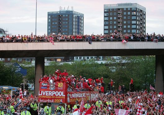 LIVERPOOL, ENGLAND - MAY 26: The team bus approaches St George's Square during the homecoming victory parade through the streets of Liverpool on May 26, 2005 in Liverpool, England. Liverpool defeated AC Milan in a penalty shoot out 3-2 to win the UEFA Champions League final. (Photo by Laurence Griffiths/Getty Images) LIVERPOOL, ENGLAND - MAY 26: The team bus approaches St George's Square during the homecoming victory parade through the streets of Liverpool on May 26, 2005 in Liverpool, England. Liverpool defeated AC Milan in a penalty shoot out 3-2 to win the UEFA Champions League final. (Photo by Laurence Griffiths/Getty Images)