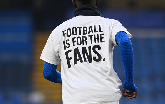 LONDON, ENGLAND - APRIL 20: Detail view as Brighton & Hove Albion players warm up wearing a t-shirt with a message in protest against the European Super League prior to the Premier League match between Chelsea and Brighton & Hove Albion at Stamford Bridge on April 20, 2021 in London, England. Sporting stadiums around the UK remain under strict restrictions due to the Coronavirus Pandemic as Government social distancing laws prohibit fans inside venues resulting in games being played behind closed doors. (Photo by Neil Hall - Pool/Getty Images) LONDON, ENGLAND - APRIL 20: Detail view as Brighton & Hove Albion players warm up wearing a t-shirt with a message in protest against the European Super League prior to the Premier League match between Chelsea and Brighton & Hove Albion at Stamford Bridge on April 20, 2021 in London, England. Sporting stadiums around the UK remain under strict restrictions due to the Coronavirus Pandemic as Government social distancing laws prohibit fans inside venues resulting in games being played behind closed doors. (Photo by Neil Hall - Pool/Getty Images)