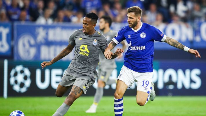 GELSENKIRCHEN, GERMANY - SEPTEMBER 18: Eder Militao #3 of FC Porto and Guido Burgstaller #19 of FC Schalke 04 battle for the ball during the Group D match of the UEFA Champions League between FC Schalke 04 and FC Porto at Veltins-Arena on September 18, 2018 in Gelsenkirchen, Germany. (Photo by Maja Hitij/Bongarts/Getty Images) GELSENKIRCHEN, GERMANY - SEPTEMBER 18: Eder Militao #3 of FC Porto and Guido Burgstaller #19 of FC Schalke 04 battle for the ball during the Group D match of the UEFA Champions League between FC Schalke 04 and FC Porto at Veltins-Arena on September 18, 2018 in Gelsenkirchen, Germany. (Photo by Maja Hitij/Bongarts/Getty Images)
