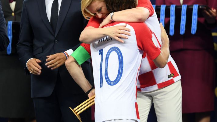 MOSCOW, RUSSIA - JULY 15: President of Croatia, Kolinda Grabar Kitarovic greets Luka Modric of Croatia as he is presented with his runners-up medal after the 2018 FIFA World Cup Final between France and Croatia at Luzhniki Stadium on July 15, 2018 in Moscow, Russia. (Photo by Matthias Hangst/Getty Images) MOSCOW, RUSSIA - JULY 15: President of Croatia, Kolinda Grabar Kitarovic greets Luka Modric of Croatia as he is presented with his runners-up medal after the 2018 FIFA World Cup Final between France and Croatia at Luzhniki Stadium on July 15, 2018 in Moscow, Russia. (Photo by Matthias Hangst/Getty Images)