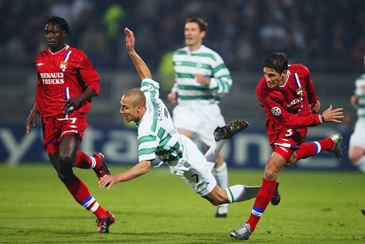 LYON - DECEMBER 10: Henrik Larsson of Celtic is fouled during the UEFA Champions League Group A match between Lyon and Celtic on December 10, 2003 at Gerland in Lyon, France. Lyon won the match 3-2. (Photo by Phil Cole/Getty Images) LYON - DECEMBER 10: Henrik Larsson of Celtic is fouled during the UEFA Champions League Group A match between Lyon and Celtic on December 10, 2003 at Gerland in Lyon, France. Lyon won the match 3-2. (Photo by Phil Cole/Getty Images)