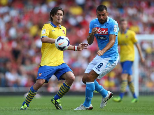 LONDON, ENGLAND - AUGUST 03: Tomas Rosickyi of Arsenal battles for the ball with Andrea Dossena of Napoli during the match between Arsenal and Napoli at Emirates Stadium on August 3, 2013 in London, England. (Photo by Paul Gilham/Getty Images) LONDON, ENGLAND - AUGUST 03: Tomas Rosickyi of Arsenal battles for the ball with Andrea Dossena of Napoli during the match between Arsenal and Napoli at Emirates Stadium on August 3, 2013 in London, England. (Photo by Paul Gilham/Getty Images)