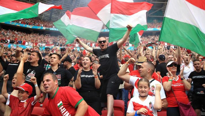 BUDAPEST, HUNGARY - JUNE 19: Fans of Hungary celebrate after their side's first goal scored by Attila Fiola of Hungary (not pictured) during the UEFA Euro 2020 Championship Group F match between Hungary and France at Puskas Arena on June 19, 2021 in Budapest, Hungary. (Photo by Alex Pantling/Getty Images) BUDAPEST, HUNGARY - JUNE 19: Fans of Hungary celebrate after their side's first goal scored by Attila Fiola of Hungary (not pictured) during the UEFA Euro 2020 Championship Group F match between Hungary and France at Puskas Arena on June 19, 2021 in Budapest, Hungary. (Photo by Alex Pantling/Getty Images)