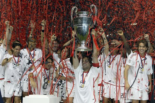 MANCHESTER, ENGLAND - MAY 28: Captain Paolo Maldini if Milan lifts the trophy after winning the UEFA Champions League Final match between Juventus FC and AC Milan on May 28, 2003 at Old Trafford in Manchester, England. (Photo by Alex Livesey/Getty Images) MANCHESTER, ENGLAND - MAY 28: Captain Paolo Maldini if Milan lifts the trophy after winning the UEFA Champions League Final match between Juventus FC and AC Milan on May 28, 2003 at Old Trafford in Manchester, England. (Photo by Alex Livesey/Getty Images)