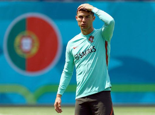 Portugal's forward Cristiano Ronaldo gestures during a training session at the Illovszky Rudolf stadium in Budapest on June 11, 2021, ahead of their UEFA EURO 2020 football match against Hungary. (Photo by FERENC ISZA / AFP) (Photo by FERENC ISZA/AFP via Getty Images) Portugal's forward Cristiano Ronaldo gestures during a training session at the Illovszky Rudolf stadium in Budapest on June 11, 2021, ahead of their UEFA EURO 2020 football match against Hungary. (Photo by FERENC ISZA / AFP) (Photo by FERENC ISZA/AFP via Getty Images)