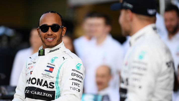 ABU DHABI, UNITED ARAB EMIRATES - NOVEMBER 28: Lewis Hamilton of Great Britain and Mercedes GP is seen at the Mercedes GP team photo in the Pitlane during previews ahead of the F1 Grand Prix of Abu Dhabi at Yas Marina Circuit on November 28, 2019 in Abu Dhabi, United Arab Emirates. (Photo by Clive Mason/Getty Images) ABU DHABI, UNITED ARAB EMIRATES - NOVEMBER 28: Lewis Hamilton of Great Britain and Mercedes GP is seen at the Mercedes GP team photo in the Pitlane during previews ahead of the F1 Grand Prix of Abu Dhabi at Yas Marina Circuit on November 28, 2019 in Abu Dhabi, United Arab Emirates. (Photo by Clive Mason/Getty Images)