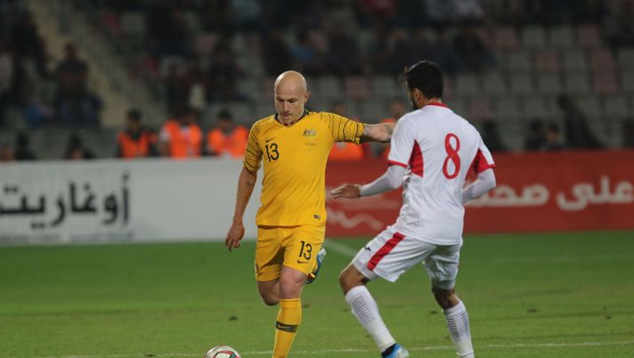 AMMAN, JORDAN- NOVEMBER 14: Trent Sainsbury of Australia and Baha' Faisal of Jordan fight for the ball during the FIFA World Cup Qatar 2022 and AFC Asian Cup China 2023 Preliminary Joint Qualification match between Jordan and the Australia Socceroos at King Abdullah II Stadium on November 14, 2019 in Amman, Jordan. (Photo by Jordan Pix/Getty Images) AMMAN, JORDAN- NOVEMBER 14: Trent Sainsbury of Australia and Baha' Faisal of Jordan fight for the ball during the FIFA World Cup Qatar 2022 and AFC Asian Cup China 2023 Preliminary Joint Qualification match between Jordan and the Australia Socceroos at King Abdullah II Stadium on November 14, 2019 in Amman, Jordan. (Photo by Jordan Pix/Getty Images)