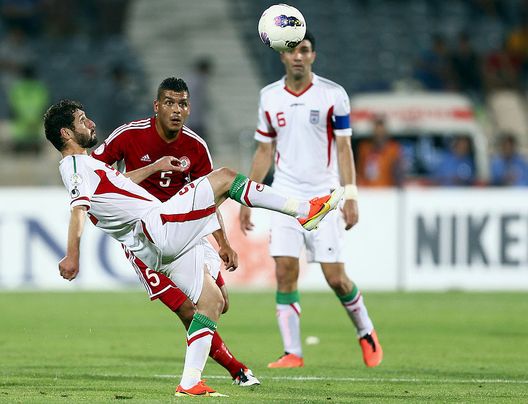 TEHRAN, IRAN - JUNE 11: Mohammad Khalatbari of Iran in action during the FIFA World Cup Asian Qualifier between Iran and Lebanon at Azadi Stadium on June 11, 2013 in Tehran, Iran. (Photo by Amin M. Jamali/Getty Images) Iran nel caos per aver vietato l’ingresso alle donne allo stadio. La federazione si difende - immagine 1