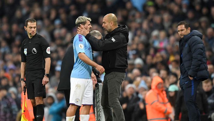 MANCHESTER, ENGLAND - NOVEMBER 23: Pep Guardiola, Manager of Manchester City embraces Sergio Aguero of Manchester City during the Premier League match between Manchester City and Chelsea FC at Etihad Stadium on November 23, 2019 in Manchester, United Kingdom. (Photo by Michael Regan/Getty Images) MANCHESTER, ENGLAND - NOVEMBER 23: Pep Guardiola, Manager of Manchester City embraces Sergio Aguero of Manchester City during the Premier League match between Manchester City and Chelsea FC at Etihad Stadium on November 23, 2019 in Manchester, United Kingdom. (Photo by Michael Regan/Getty Images)