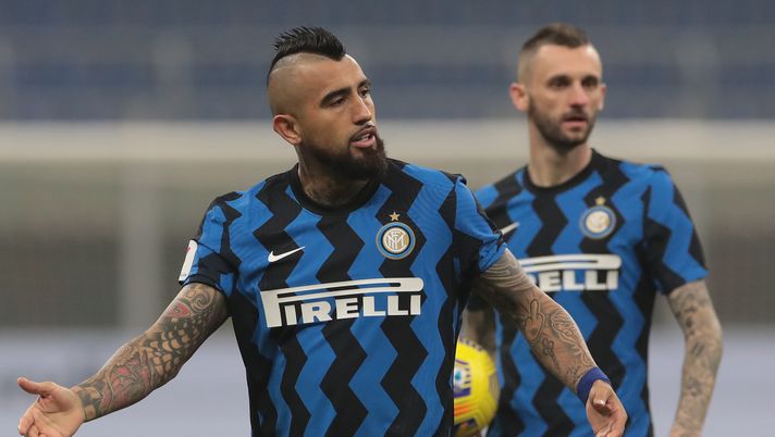 MILAN, ITALY - FEBRUARY 02: Arturo Vidal of FC Internazionale reacts during the Coppa Italia semi-final match between FC Internazionale and Juventus at Stadio Giuseppe Meazza on February 02, 2021 in Milan, Italy. Sporting stadiums around Italy remain under strict restrictions due to the Coronavirus Pandemic as Government social distancing laws prohibit fans inside venues resulting in games being played behind closed doors. (Photo by Emilio Andreoli - Inter/Inter via Getty Images) MILAN, ITALY - FEBRUARY 02: Arturo Vidal of FC Internazionale reacts during the Coppa Italia semi-final match between FC Internazionale and Juventus at Stadio Giuseppe Meazza on February 02, 2021 in Milan, Italy. Sporting stadiums around Italy remain under strict restrictions due to the Coronavirus Pandemic as Government social distancing laws prohibit fans inside venues resulting in games being played behind closed doors. (Photo by Emilio Andreoli - Inter/Inter via Getty Images)