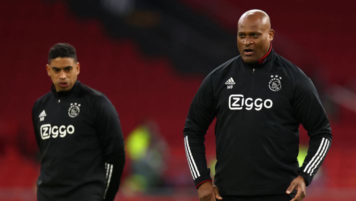 AMSTERDAM, NETHERLANDS - APRIL 08: Winston Bogarde, Assistant Manager of Ajax looks on prior to the UEFA Europa League Quarter Final First Leg match between Ajax and AS Roma at Johan Cruijff Arena on April 08, 2021 in Amsterdam, Netherlands. Sporting stadiums around Europe remain under strict restrictions due to the Coronavirus Pandemic as Government social distancing laws prohibit fans inside venues resulting in games being played behind closed doors. (Photo by Dean Mouhtaropoulos/Getty Images) AMSTERDAM, NETHERLANDS - APRIL 08: Winston Bogarde, Assistant Manager of Ajax looks on prior to the UEFA Europa League Quarter Final First Leg match between Ajax and AS Roma at Johan Cruijff Arena on April 08, 2021 in Amsterdam, Netherlands. Sporting stadiums around Europe remain under strict restrictions due to the Coronavirus Pandemic as Government social distancing laws prohibit fans inside venues resulting in games being played behind closed doors. (Photo by Dean Mouhtaropoulos/Getty Images)