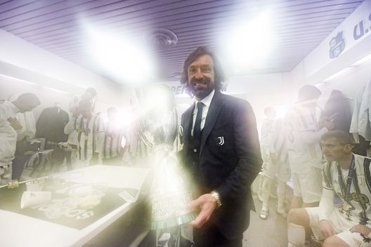 REGGIO NELL'EMILIA, ITALY - JANUARY 20: head coach of Juventus Andrea Pirlo celebrates with the trophy after winning the Italian PS5 Supercup after the Italian PS5 Supercup match between Juventus and SSC Napoli at Mapei Stadium - Citta' del Tricolore on January 20, 2021 in Reggio nell'Emilia, Italy. (Photo by Daniele Badolato - Juventus FC/Juventus FC via Getty Images) REGGIO NELL'EMILIA, ITALY - JANUARY 20: head coach of Juventus Andrea Pirlo celebrates with the trophy after winning the Italian PS5 Supercup after the Italian PS5 Supercup match between Juventus and SSC Napoli at Mapei Stadium - Citta' del Tricolore on January 20, 2021 in Reggio nell'Emilia, Italy. (Photo by Daniele Badolato - Juventus FC/Juventus FC via Getty Images)