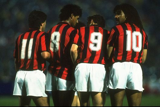 1989: (left to right) Carlo Ancelloti, Frank Rijkaard, Marco Van Basten and Ruud Gullit of AC Milan line up in the wall against Real Madrid during the European Cup semi-final played at the Sansiro stadium in Milan. AC Milan won the match 5-0. Mandatory Credit: Simon Bruty/Allsport