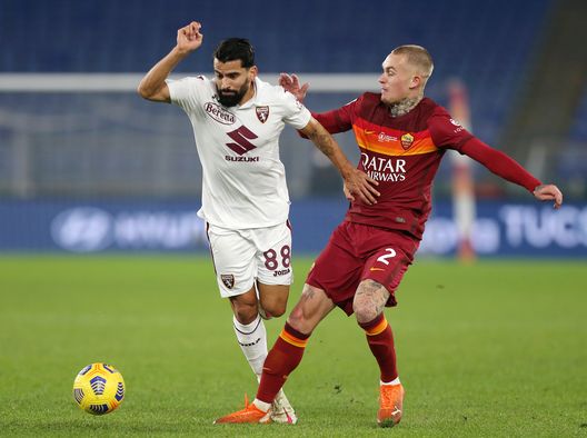 ROME, ITALY - DECEMBER 17: Tomas Rincon of Torino is challenged by Rick Karsdorp of Roma during the Serie A match between AS Roma and Torino FC at Stadio Olimpico on December 17, 2020 in Rome, Italy. The match will be played without fans, behind closed doors as a Covid-19 precaution. (Photo by Paolo Bruno/Getty Images) ROME, ITALY - DECEMBER 17: Tomas Rincon of Torino is challenged by Rick Karsdorp of Roma during the Serie A match between AS Roma and Torino FC at Stadio Olimpico on December 17, 2020 in Rome, Italy. The match will be played without fans, behind closed doors as a Covid-19 precaution. (Photo by Paolo Bruno/Getty Images)