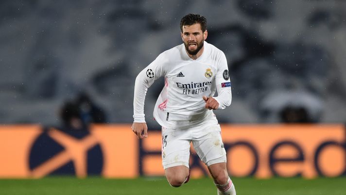 MADRID, SPAIN - APRIL 27: Nacho Fernandez of Real Madrid runs with the ball during the UEFA Champions League Semi Final First Leg match between Real Madrid and Chelsea FC at Estadio Alfredo Di Stefano on April 27, 2021 in Madrid, Spain. Sporting stadiums around Spain remain under strict restrictions due to the Coronavirus Pandemic as Government social distancing laws prohibit fans inside venues resulting in games being played behind closed doors. (Photo by Denis Doyle/Getty Images)(Photo by Denis Doyle/Getty Images) MADRID, SPAIN - APRIL 27: Nacho Fernandez of Real Madrid runs with the ball during the UEFA Champions League Semi Final First Leg match between Real Madrid and Chelsea FC at Estadio Alfredo Di Stefano on April 27, 2021 in Madrid, Spain. Sporting stadiums around Spain remain under strict restrictions due to the Coronavirus Pandemic as Government social distancing laws prohibit fans inside venues resulting in games being played behind closed doors. (Photo by Denis Doyle/Getty Images)(Photo by Denis Doyle/Getty Images)