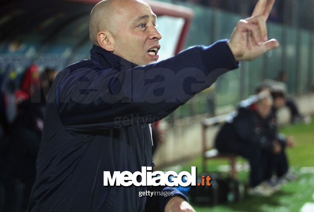 Antonio Galardo of Crotone battles for the ball with Nicolas Viola of Reggina during the Serie B match between Crotone and Reggina at Stadio Comunale Ezio Scida on January 17, 2011 in Crotone, Italy. 