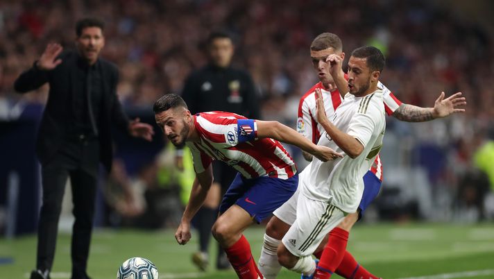 MADRID, SPAIN - SEPTEMBER 28: Koke of Atletico Madrid battles for the ball with Eden Hazard of Real Madrid during the Liga match between Club Atletico de Madrid and Real Madrid CF at Wanda Metropolitano on September 28, 2019 in Madrid, Spain. (Photo by Angel Martinez/Getty Images) MADRID, SPAIN - SEPTEMBER 28: Koke of Atletico Madrid battles for the ball with Eden Hazard of Real Madrid during the Liga match between Club Atletico de Madrid and Real Madrid CF at Wanda Metropolitano on September 28, 2019 in Madrid, Spain. (Photo by Angel Martinez/Getty Images)